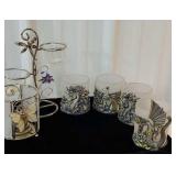 Box of candle holders including unicorns dragon,