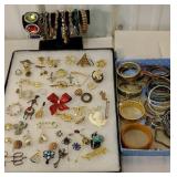 Group of bracelets, and many brooches and pins