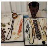 2 displays of jewelry includes many necklaces,