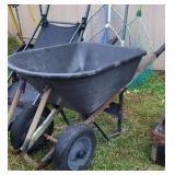 2 wheel plastic wheelbarrow
 needs tube