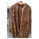 Fur coat - coming apart on the back arm seam