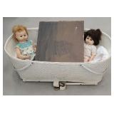 Baby bassinet, ship print on wood, and 2 dolls