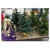 7 small artificial Christmas trees - 2 pre-lit