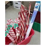 Red tub of Christmas includes light up lawn candy