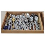 Wooden box of stainless steel flatware