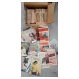 quantity of paper patterns and work basket