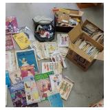 Large group of sewing patterns, zippers,