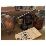 box of oil cans and oil