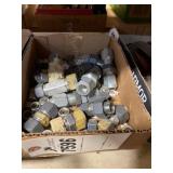 box of metal couplings and fittings