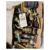 box of large brass shut-off valves