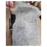 gray colored 5 x 8 accent floor rug nonskid back