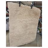 tan colored 4 x 6 accent floor rug with non skid b