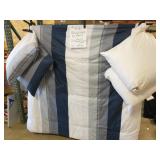 Blues w/ white pattern bed cover w/ pillows