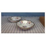 2 floral bowls with triangular cut away pattern