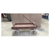 Brown wooden wagon w/ spoked wheels