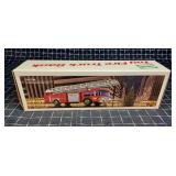 Byron 7 1pc Hess Fire Truck Bank 14x3x5" red