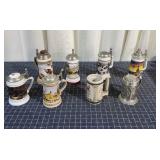 Q2 8Pc Metal top Beer steins one does not have met