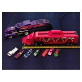 C3 9Pc Hotwheels car haulers Comes with cars nit a