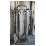 Complete four-piece fireplace tool set with matchi