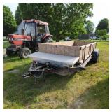 This versatile 18-foot tandem axle trailer feature