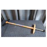 Huffy Nitro Hopper pogo stick with orange foam-pad