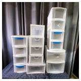Assortment of stackable plastic storage drawers, p