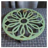 Decorative cast iron plant stand/caddy featuring a