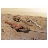 assorted pipe wrenches