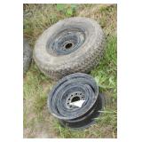 Pair of 14" multi bolt pattern rims w/ tire