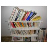 Bookshelf with books and magazines