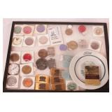 group of vintage plant badges and automotive items