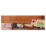 group of toy dairy trucks