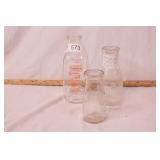 group of cream & milk bottles