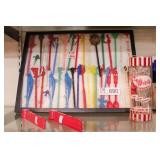 group of vintage decorative stir sticks