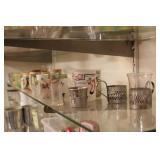 large group of vintage shot glasses