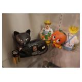 group of vintage advertising coin banks