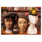 group of mannequin heads & hats