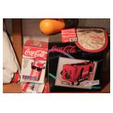 group of coca cola collectibles