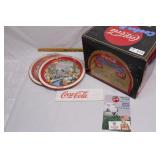group of coca cola collectibles