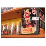 group of coca cola collectibles