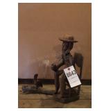 Hand Carved Man on a Chair & Small Pelican on Log