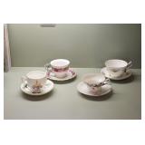 Group of 4 Teacups & Saucers