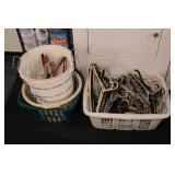 Group of laundry baskets, includes hangers
