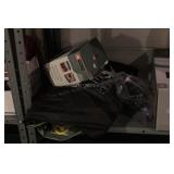 contents of bottom shelf