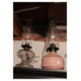 Two small oil lamps