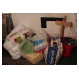 Group of fiberfill, bubble wrap, yarn, easel