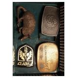 Three belt buckles & fiero emblem