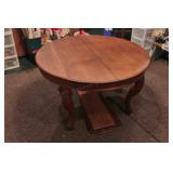 48" oak dining table w/ 4 leaves