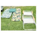 Two folding lawn chairs