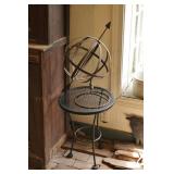 Metal sun dial & small black metal table